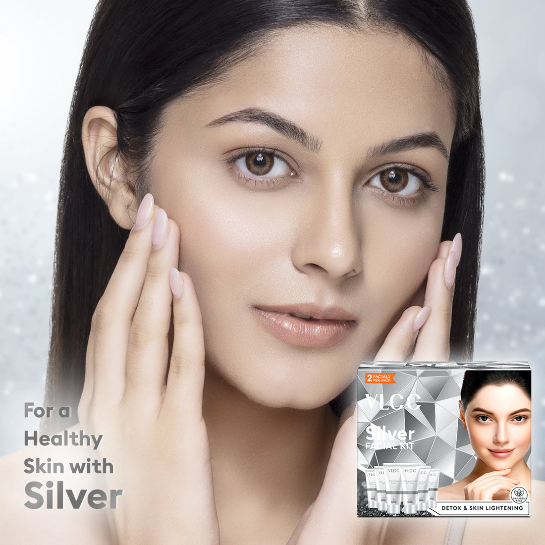 Woman touching her face with a skincare product packaging labeled 'Silver' in the corner.